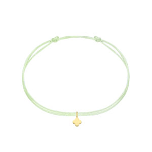 Deze bedel van Minioro is gemaakt van 14 karaats goud. Aan dit armbandje had een klaver.