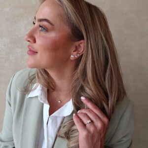14 karaats goud ketting met peervormige en ovale diamant 0.50 ct